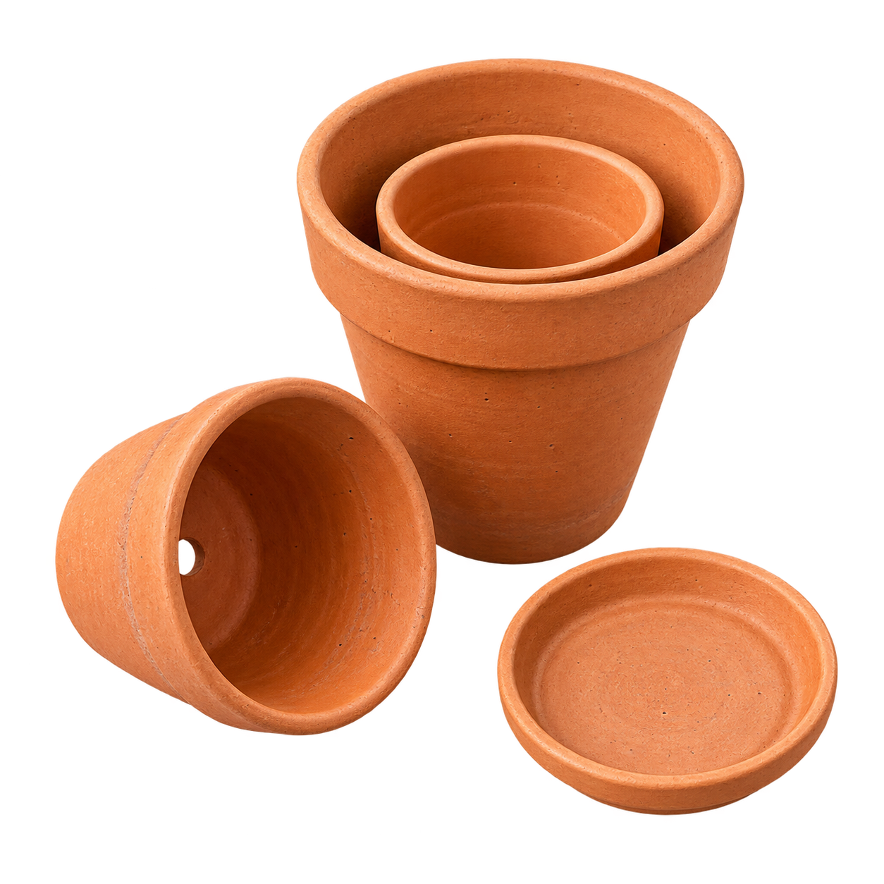 Terracotta potten in drie verschillende maten
